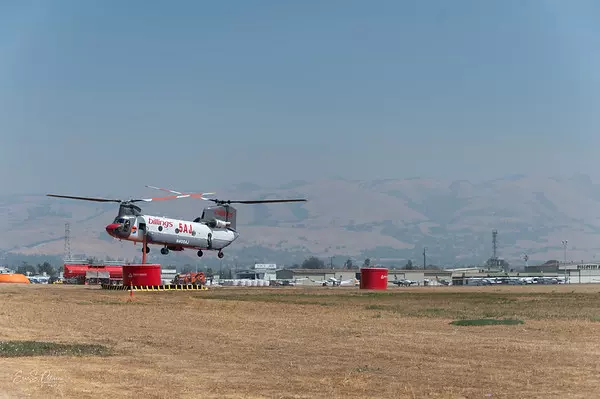 Chinook reloading Phos-Chek fire retardant at Reid-Hillview Airport 